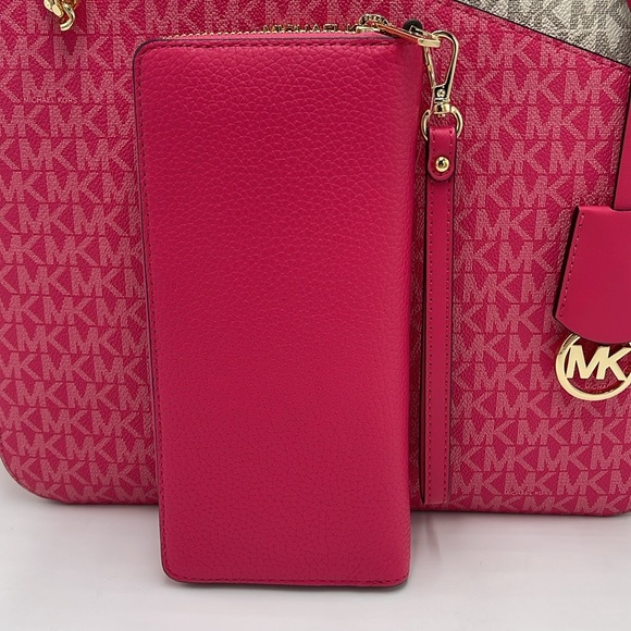 MICHAEL KORS
Leather Continental Wristlet Phone Case Wallet 
Electric Pink 
NWT - Picture 8 of 16